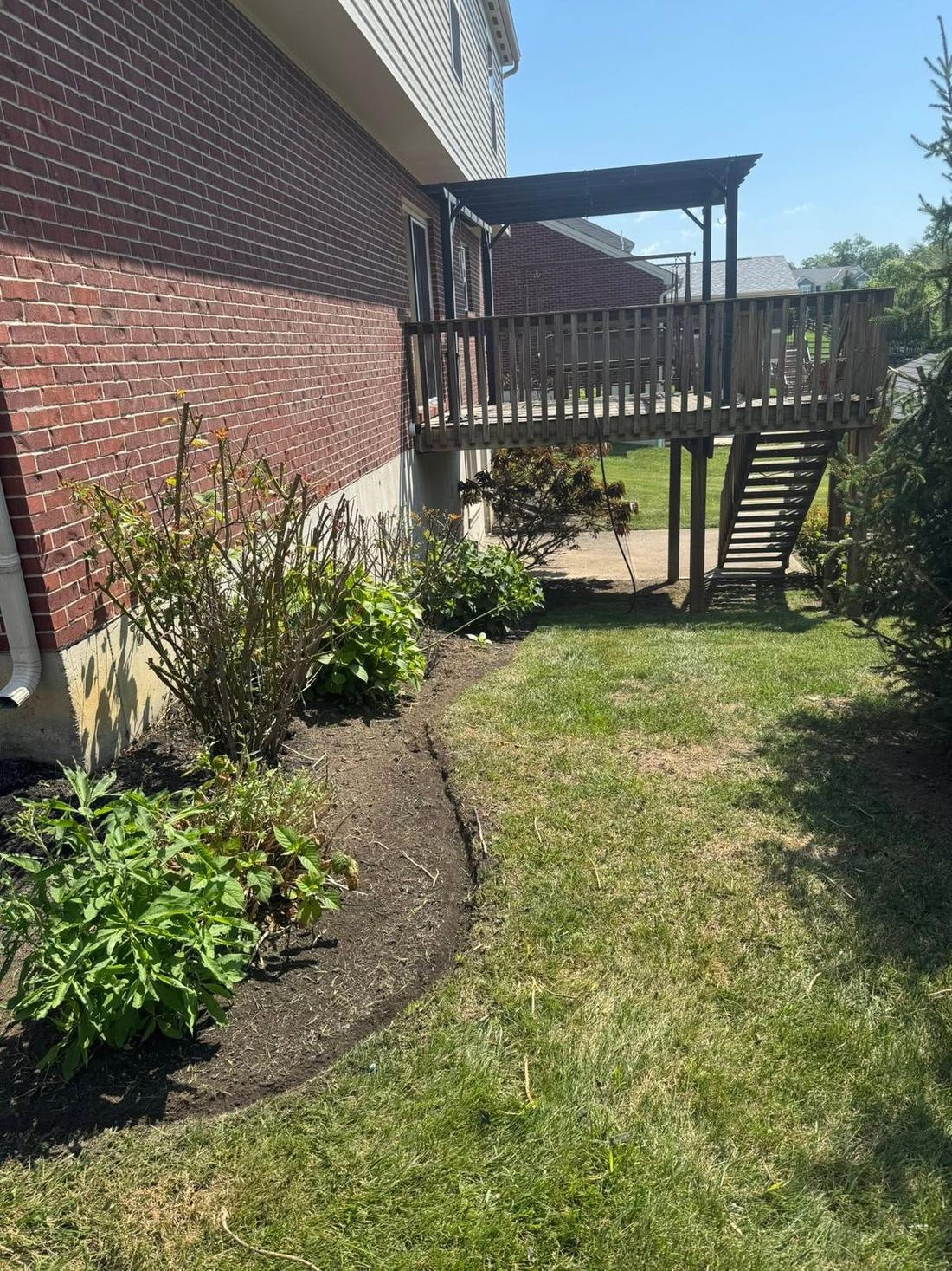 Bed work under a raised deck